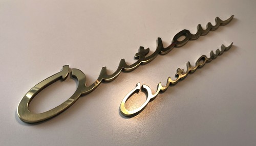 Distintivo emblema script