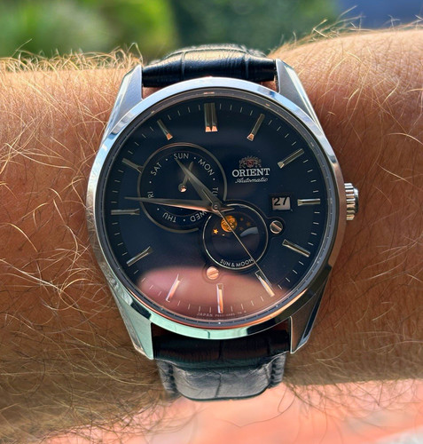 Sole luna orologio orient - e,