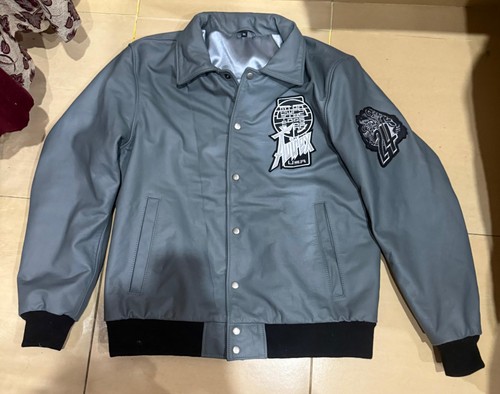 Giubbotto uomo grigio pelle