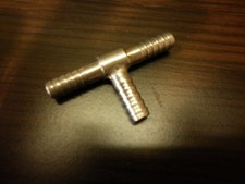 Nipplo acciaio inox 7mm.   a T