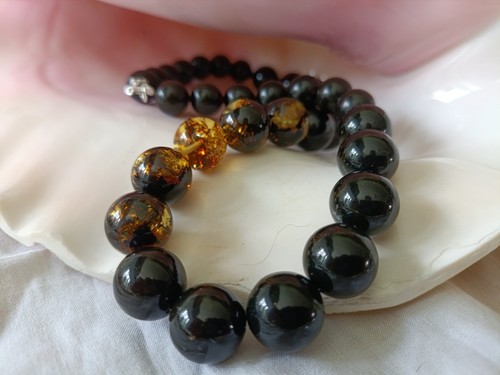 Collana ambra nero-verde-oro