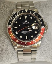 Rolex GMT Master II Coke Black