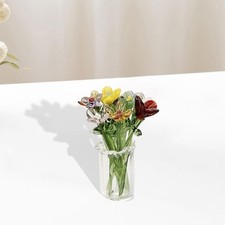 Collezione di piccoli vasi in