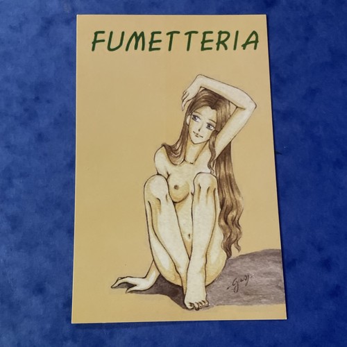Nuda seduta fumetteria - nuda,