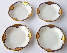 Set Di 4 Piatti/ Ciotole