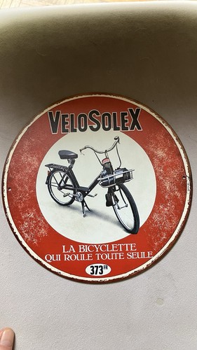 Plaque ronde murale en - murale.,