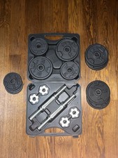 set manubri dechatlon da 20kg + 10kg di dischi aggiuntivi
