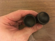 2 manopole in bachelite nera? Piedi? con vite a testa philips in base