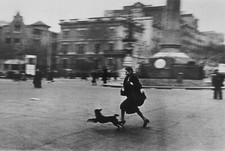 Robert Capa | Running For Shelter During the Air Raid Alarm. Barcelona, 1939