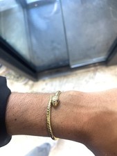Bracciale a serpente rigido in oro 18kt