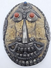 Antica maschera conchiglia