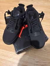 Nike Jordan 4 gatti neri