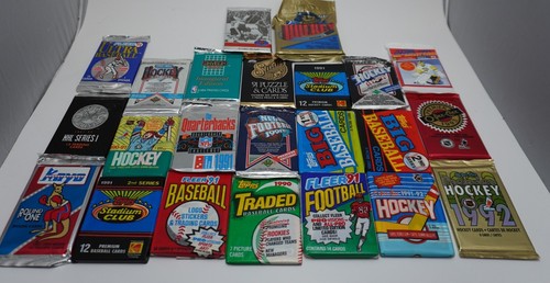 Sealed sports cards packs - cards,