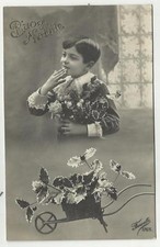 antica cartolina di bimbo bambino  buon natale con carriola spedita da monza