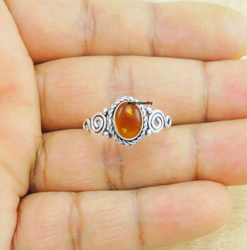 Anello con pietre preziose