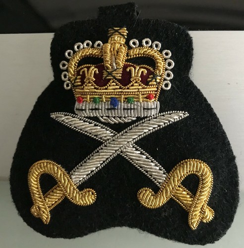 Distintivo inglese con - , le
