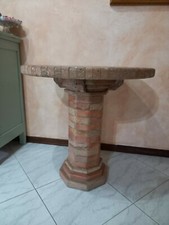 Tavolo tondo  in mattoni refrattari fatto a mano.
