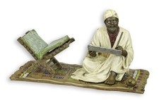 Una scultura in bronzo raffigurante uno scrittore replica design retrò decorazio