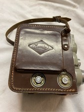 Macchina fotografica Eumig C3 con custodia in pelle danneggiata