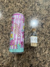 Candela in latta per caramelle