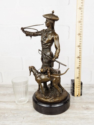 Statua bronzo cani - in,
