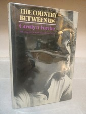 COUNTRY BETWEEN US Carolyn