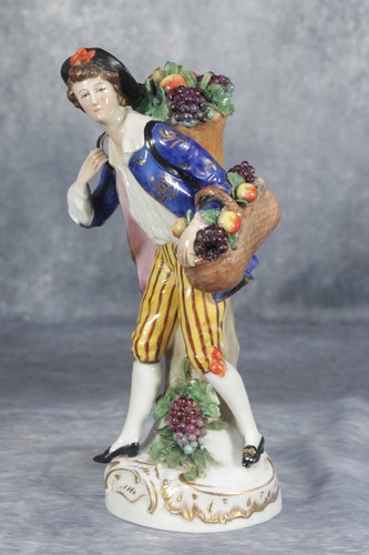 Antica statuina raccoglitore