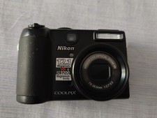 NIKON COOLPIX P5100 NON FUNZIONANTE SOLO CORPO  X PEZZI DI RICAMBIO