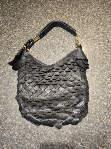 Yves saint laurent - saint, a