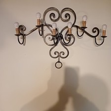 Lampadario a parete per