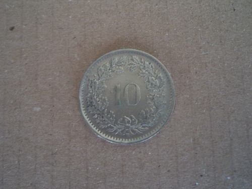 Moneta svizzera dieci - moneta,