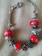 BRACCIALE METALLO CON ELEMENTI