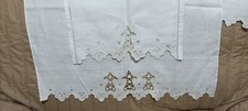 Asciugamani in lino ricamati a mano