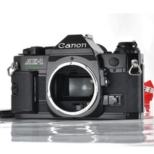 Canon AE-1 Program 35 mm fotocamera reflex pellicola corpo nero dal...