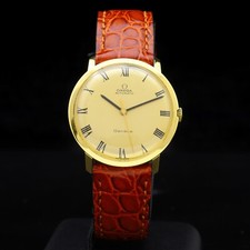 Omega Geneve 60s 18 kt gold 33
