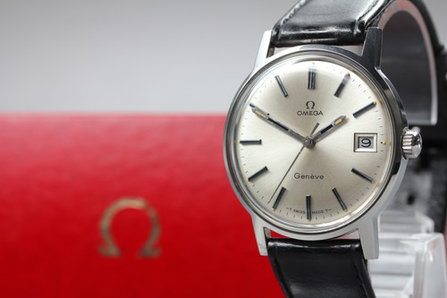 Near mint box omega - /, box]