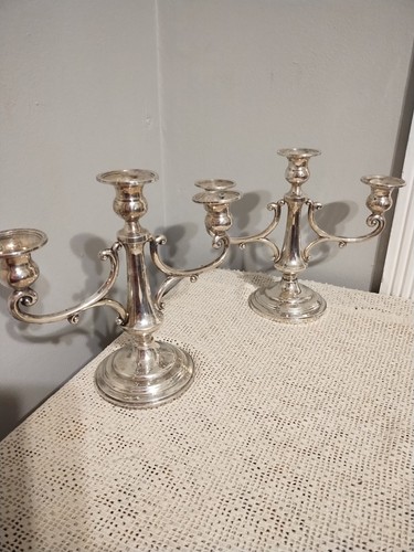 Coppia antichi candelabri - di,