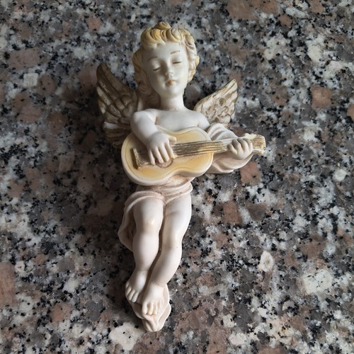 Statuina angelo