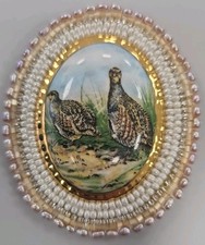 Splendida spilla uccellino