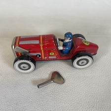 Auto da corsa giocattolo latta