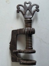 antico artistico morsetto da