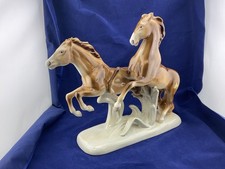 statuina coppia cavalli