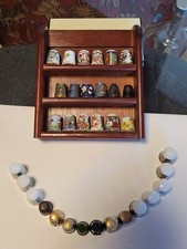 33 ditali in porcellana e