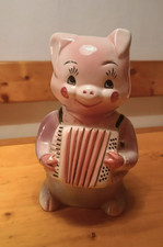 Salvadanaio in ceramica a forma di maialino, grande, con tappo.