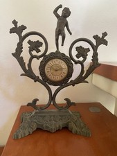 Orologio da tavolo con putto