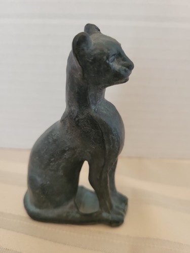 Vintage metal egyptian sitting - metal,