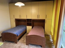 Cameretta bambini due letti a ponte.