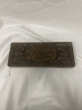 Antica sedia da barbiere Koken