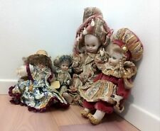 Bambole antiche in Porcellana e Stoffa