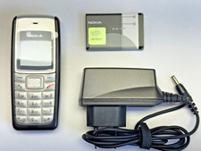 Nokia 1110i ARGENTO senza SIM-lock con caricabatterie e batteria cellulare a tasti cellulare per anziani